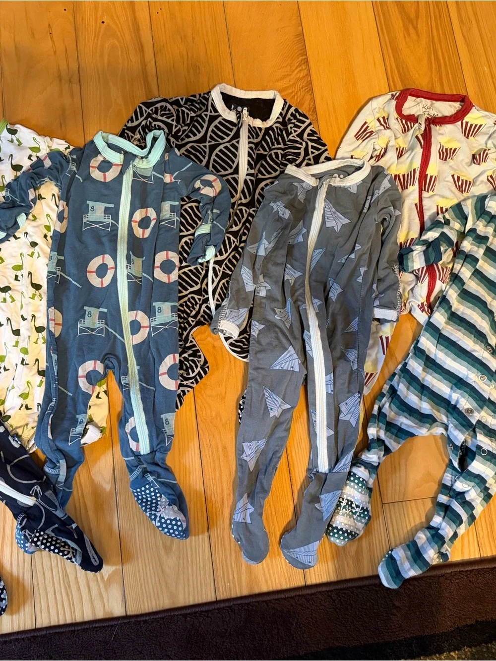 Kickee Pants Mixed Print Footed Sleepers in Blue, Green & Red
